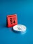 2024 numbers year with target dart icon on red desk calendar cover stand and compass on blue background.