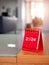 2024 numbers year with target icon on red small desk calendar cover standing on table.