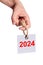 2024 tag on thick rope hanging on finger