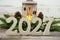 2027 Happy New Year with Christmas lantern decorative on wooden background