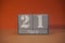 21 Marz on wooden grey cubes. Calendar cube date 21 March. Concept of date. Copy space for text. Educational cubes