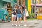 22 august 2017, Big city small street with young girls tourists taking selfie in colorful Little India District in asian metropoli