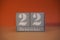 22 Dezember on wooden grey cubes. Calendar cube date 22 December. Concept of date. Copy space for text. Educational cube