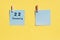 22 January. 22th day of the month, calendar date. Two blue sheets for writing on a yellow background. Top view, copy space. Winter