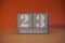 23 Dezember on wooden grey cubes. Calendar cube date 23 December. Concept of date. Copy space for text. Educational cube