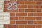 23 house number on brick wall