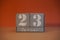 23 Januar on wooden grey cubes. Calendar cube date 23 January. Concept of date. Copy space for text. Educational cubes