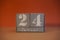 24 Januar on wooden grey cubes. Calendar cube date 24 January. Concept of date. Copy space for text. Educational cubes