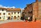 25.05.2019. People on the main square in old historic alley in the medieval village of Anghiari near city of Arezzo in Tuscany, It