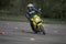 25-05-2020 Riga, Latvia. Motorcyclist goes on road, front view, closeup