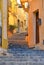 25.08.2018. View of a narrow street with steps, old buildings and facades in the historical city of Agrigento in Sicily, Italy