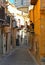 25.08.2018. View of narrow street with steps, old buildings and facades in the historical city of Agrigento in Sicily, Italy