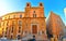 25.08.2018. View of square with people on steps, old buildings and facades in the historical city of Agrigento in Sicily,