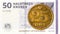 25 danish oere coin against 50 danish krone note