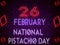 26 February National Pistachio Day, Neon Text Effect on Bricks Backgrand