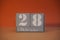 28 Februar on wooden grey cubes. Calendar cube date 28 February. Concept of date. Copy space for text. Educational cubes