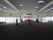 28 jun 20, Donmueng Airport, Bangkok, Thailand. Group of cabin crew in red uniform waking with trolley bag in empty terminal. Airp