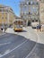 the 28 number tramway running through the streets of the historic center of Lisbon