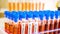 28022_The_blue_chemicals_on_the_beaker_and_the_tubes_with_coronavirus_samples.jpg