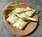 29. Ketupat Shells from Young Coconut Leaves on a Wicker Rattan Plate (29)