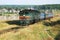 The 2te10 diesel locomotive moves along the railroad tracks in Russia