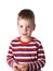 3-4 years cheerful handsome boy in a striped T-shirt in the stud