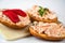 3 canapÃ©s with salmon spread with fresh cheese on board