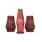 3 decorative black vases with a red stripe