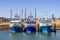 3 Fishing boats moored.