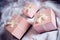 3 gorgeous beautiful luxury boxes pink presents with white ribbon on white bed background picture