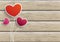3 Hearts Wooden Background
