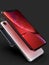 3 iPhone XR Red, silver and Space Grey smart phones on black