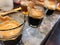 3 perfect espresso shots in glass on the cement counter.