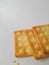 3 pieces of sugar cracker biscuit on white background