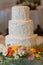 3 tiered wedding cake with textured butter cream frosting