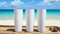 3 white tumblers with a beach background