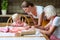 3 women generation baking cookies together