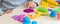 3 years girl creative arts. Child hands playing with colorful clay plasticine. Self-isolation Covid-19, online education,