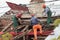 30.08.2020 Russia, Moscow. Replacing the roof in an apartment building . Workers dismantle the roof