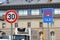 30kmh speed limit road sign and end of taxi rank parking road sign next to each