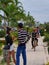 31 december 2016 otres beach sihanoukville cambodia, young asian couple facing each other on a small path close to the beach edito