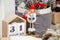 31 december cubic wooden calendar with Christmas decorative elements, soft toy and pine cones