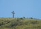 The 33 m tall cross on the Hum Hill which dominates the city, perceived by some local Muslims the cross as offensive.During the