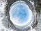 360 degree panoramic aerial drone little planet view of an abstract snow world turned inside out planet earth with nature and
