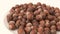 360 degree rotating stand shelled nuts very close-up