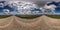 360 hdri panorama on no traffic sand gravel road among fields with blue overcast sky with clouds  in equirectangular seamless