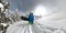 360, OVERCAPTURE, 3D: Freerider walks uphill to start his descend down mountain.