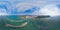 360 panorama by 180 degrees angle seamless panorama of aerial view of pier with boats with container cargo ship in the export and