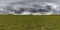 360 seamless hdr panorama view among fields with clouds in gray overcast  sky before storm in equirectangular spherical projection