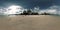 360 VR beautiful beach sea sand and sky. The big sun in the clouds touches the horizon. Asian palm beach background